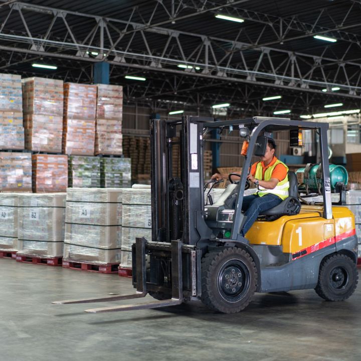 asian-male-driver-driving-forklift-to-shipping-del-2025-03-06-03-22-44-utc.jpg
