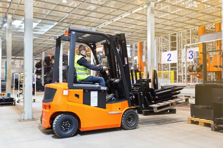 storehouse-employee-in-uniform-working-on-forklift-2024-11-07-13-16-34-utc.jpg