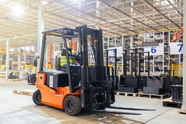 storehouse-employee-in-uniform-working-on-forklift-2024-11-07-13-19-21-utc.jpg