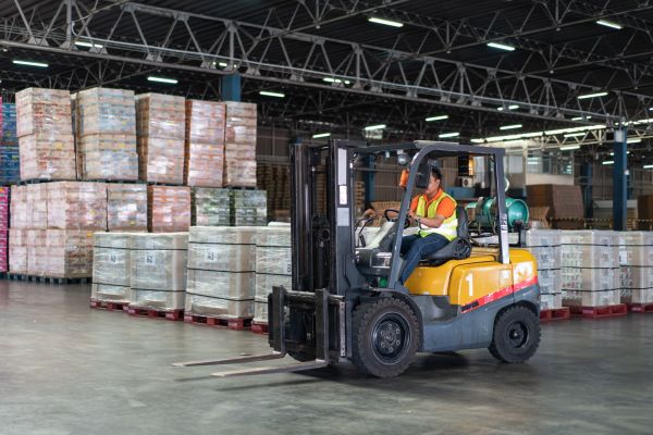 asian-male-driver-driving-forklift-to-shipping-del-2025-03-06-03-22-44-utc.jpg